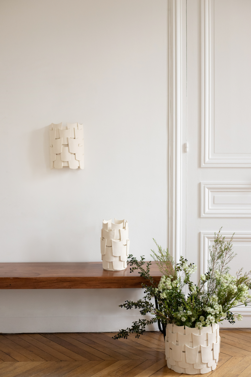 Vase Sève Small format in raw chamotte stoneware by Adeline Delesalle. Stylized leaf forms, slender profile. Caroline Andréoni Exclusive.