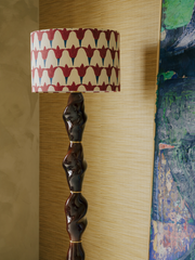 Floor lamp Casadio by Ombre d'Or, in porcelain and brass with a Schumacher tulip lampshade. Inspired by Tarot Arcana XVI, its twisted column embodies the light of rebirth.