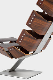 Le Fauteuil Actarus II par HERVET Manufacturier, cuir pleine fleur, palissandre Dos Santos et inox brossé, fabriqué en France.