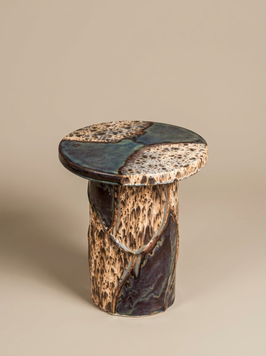 Side table Basalte by Diane Fekete, hand-glazed chamotte stoneware from her Marseille atelier. A functional sculpture, organic forms and a unique play of nuances in each piece.
