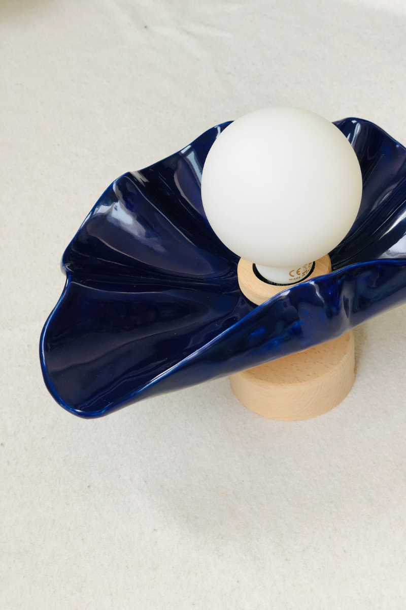 Wall sconce Concha by Carré Coco, ceramic and wood hand-formed in Portugal by Coline. Inspired by the ocean and its shells, soft light through natural curves.