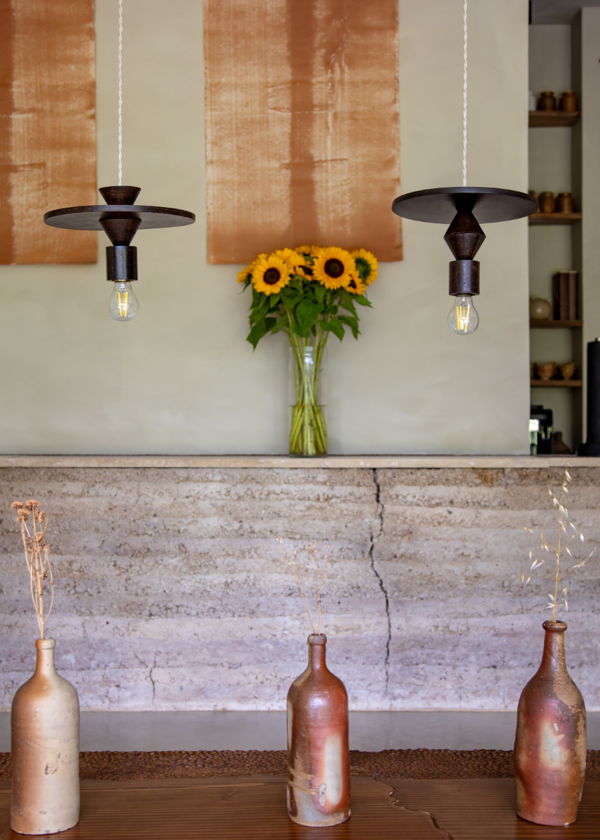 La suspension Gaia a été pensée et dessinée en interne par leur studio de création basé en Normandie. Son design épuré est conçu de façon modulable afin de vous proposer une composition presque infinie de style.

À travers cette création, nous souhaitons valoriser l’artisanat français et pousser la définition du durable jusqu’à son apogée ; vous permettant de changer de style, sans changer de luminaire. Ses modules sont fabriqués en Ile-de-France dans un atelier confectionnant la matière première.