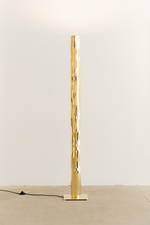 Floor lamp Hélios by Atelier Tison, mirror-polished unvarnished brass sculpture. Concealed light and reflection of its height in the base create an illusion of infinity.