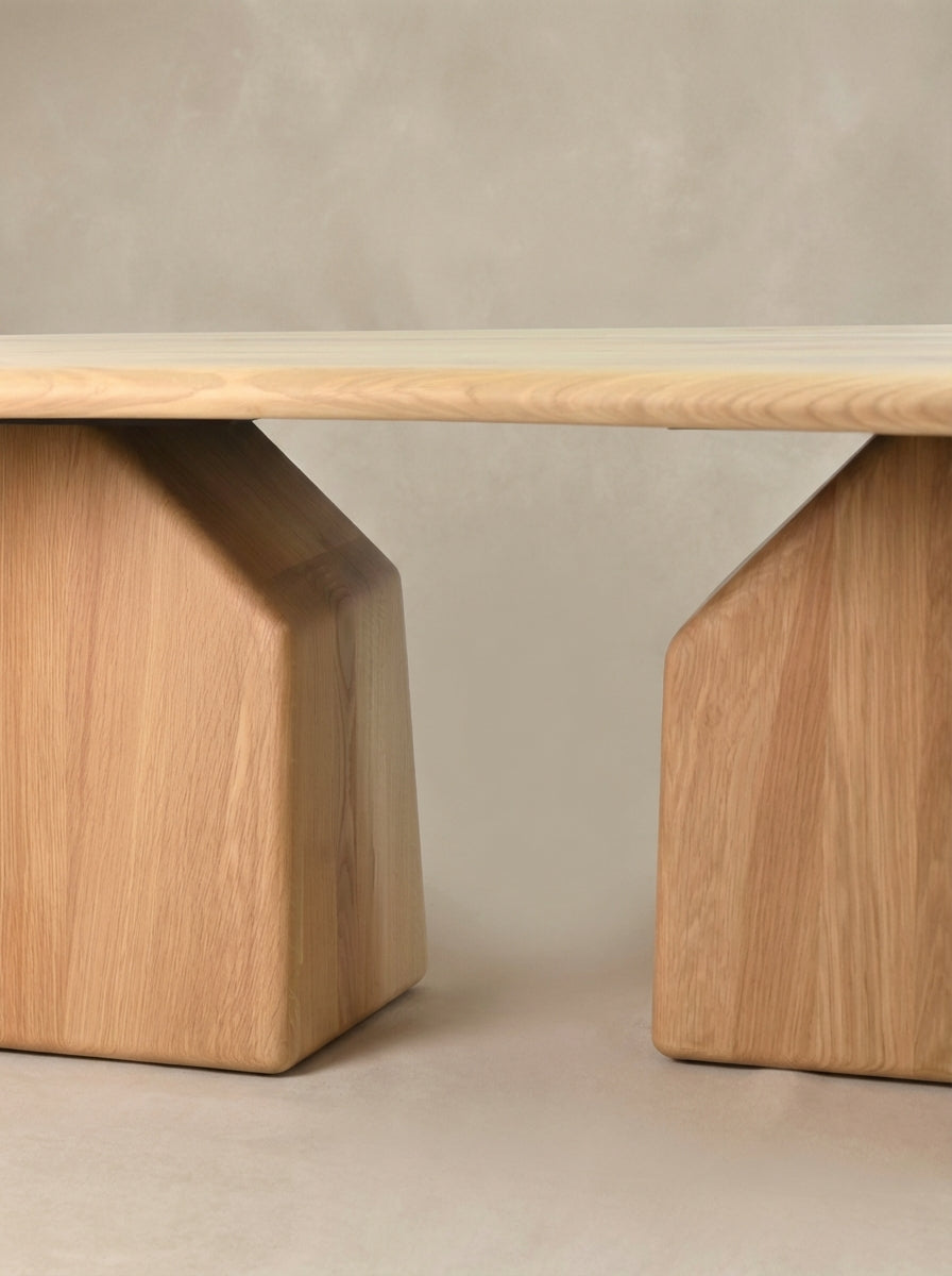 Dining table Elmer by Thomas Coup La Fronde, rounded light oak top on hand-sculpted monolithic legs. Sculptural, organic design, crafted in Lyon for 8 to 10 guests.