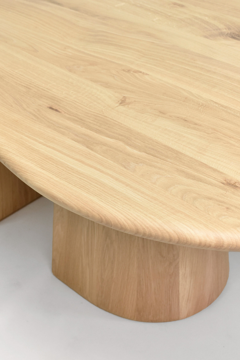 Dining table Elmer by Thomas Coup La Fronde, rounded light oak top on hand-sculpted monolithic legs. Sculptural, organic design, crafted in Lyon for 8 to 10 guests.